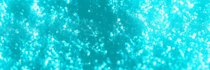 abstract background of snow tinted in blue color in banner format