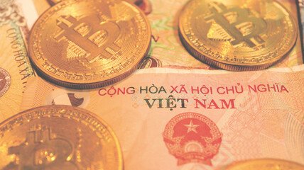 Close up the Vietnamese Dong Banknotes and Bitcoin