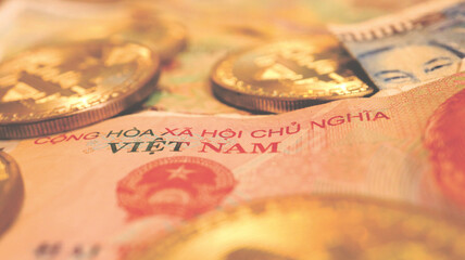Close up the Vietnamese Dong Banknotes and Bitcoin