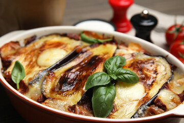 Delicious eggplant lasagna in baking dish, closeup