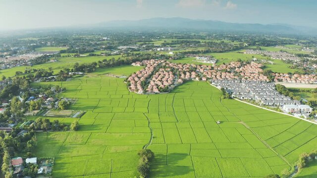 Land or landscape in aerial view. Include agriculture farm, house building, village. Real estate or property. Plot of land in San Na Meng Subdistrict, San Sai District, Chiang Mai, Thailand.