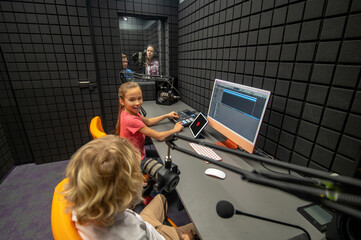 Kids in the studio during music recording