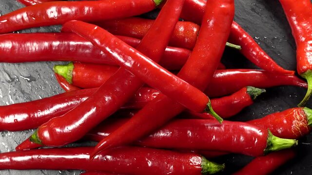 Clean red chilly pepper  rotation background. Close up.