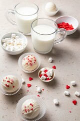Hot cocoa chocolate ball bomb with marshmallow. Holiday winter drink. Handmade Valentines day present. Selective focus.