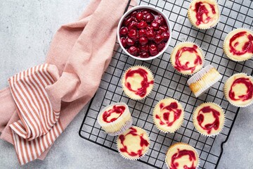 Marble mini cheesecake with cherry jam. One bite dessert. Tiny cheesecakes with berry. Valentine...