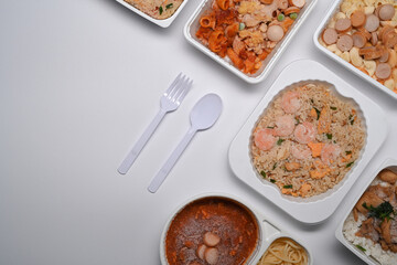 Flat lat, various instant frozen food on white background.