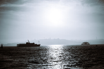 Monochrome Istanbul background photo. Ferry and cityscape of Istanbul.