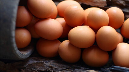 chicken eggs on wooden background