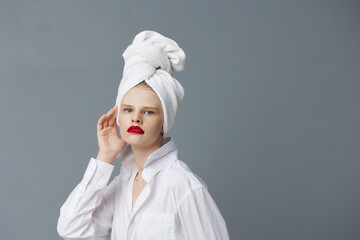 glamorous woman white shirt cosmetics with towel on head Lifestyle posing