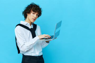 freelancer with laptop internet in a white shirt with a sweater cropped view