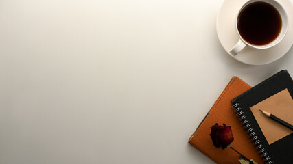 Obraz na płótnie Canvas A minimalist white office desk with copy space for your presentation.