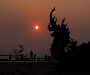 silhouette Naga's head at temple.