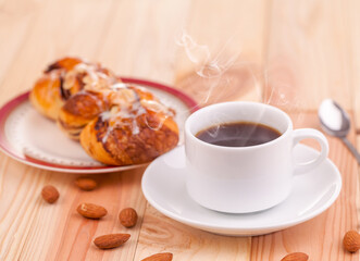 hot coffee cup and dessert