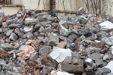 close-up construction debris after a destroyed old house