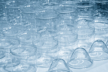 The group of transparent plastic container in the light blue scene.
