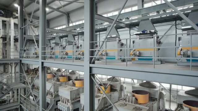 Separators in a large industrial plant. Crushing sunflower seeds, and separating the husks from the kernels.
