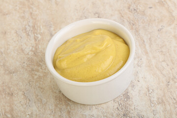 Organic mustard sauce in the bowl