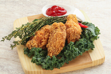 Crispy chicken wings with tomato ketchup