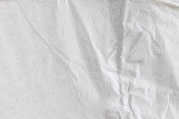 Obraz premium Top view of crumpled white paper. White and wrinkled texture background.