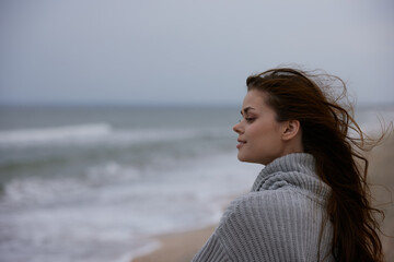 pretty woman cloudy weather by the sea travel fresh air Lifestyle