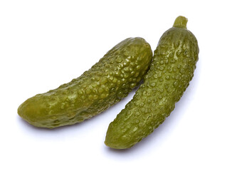 Tasty Whole green cornichons isolated on a white background