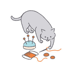 裁縫道具と遊ぶ猫