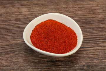 Dry paprika powder in the bowl