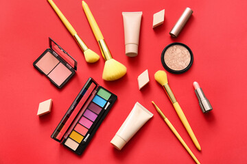 Decorative cosmetics on red background