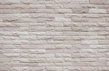 Cream and white brick wall texture background. Background of old vintage brick wall backdrop