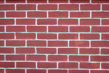 Red brick wall closeup. The structure of the background. Mockup for design. 