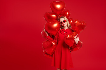 lady with heart balloons