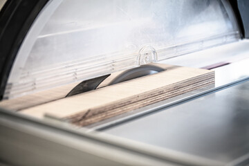 close up of a table saw in a carpenter's shop or workshop