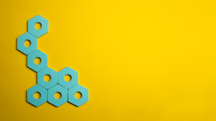 wooden blue shapes on a yellow background