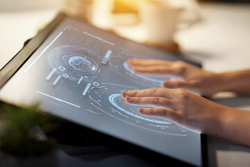 technology and people concept - hands on led light tablet or touch screen with virtual projection at night office