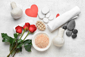 Obraz na płótnie Canvas Beautiful spa composition with stones for Valentine's Day celebration on light background