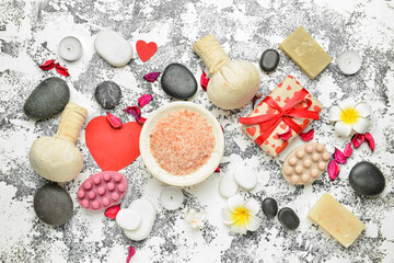 Fototapeta na wymiar Beautiful spa composition with stones for Valentine's Day celebration on grey background