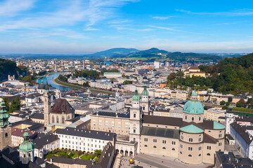 Fototapeta premium Beautiful Salzburg city Austria, top view from Hohensalzburg castle, world heritage town with blue sky background.