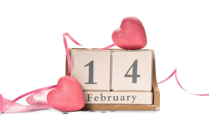 Calendar with date of Valentines Day and plastic hearts on white background