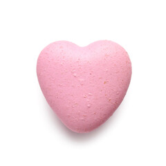 Tasty heart-shaped macaroon on white background