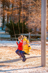 Adorable little girls having fun in Central Park at New York City