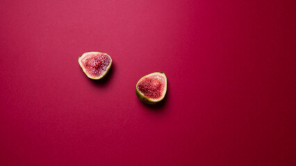 a ripe fig fruit cut in half