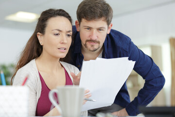 a couple doing paper work