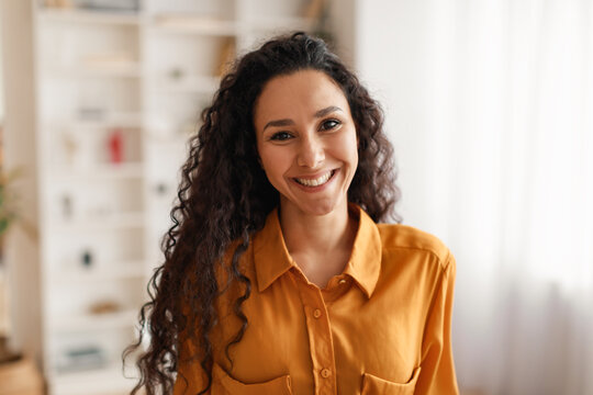 Happy Middle Eastern Businesswoman Wearing Shirt Smiling To Camera Indoors