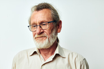 Senior grey-haired man wears glasses in shirts cropped view