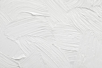 Strokes of white oil paint as background, closeup