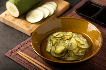 Sunomono. Plate with Japanese cucumber salad.