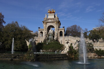Classic fountain in a park of Barcelona - obrazy, fototapety, plakaty