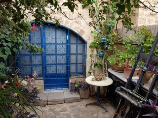 Fototapeta na wymiar Cozy courtyard with a plant