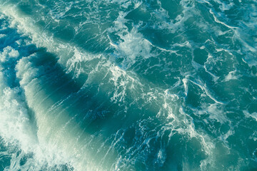 Sea water texture background. Waves and sea foam. Top view.
