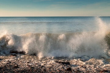 Sea landscape. Waves crashing on the shore.